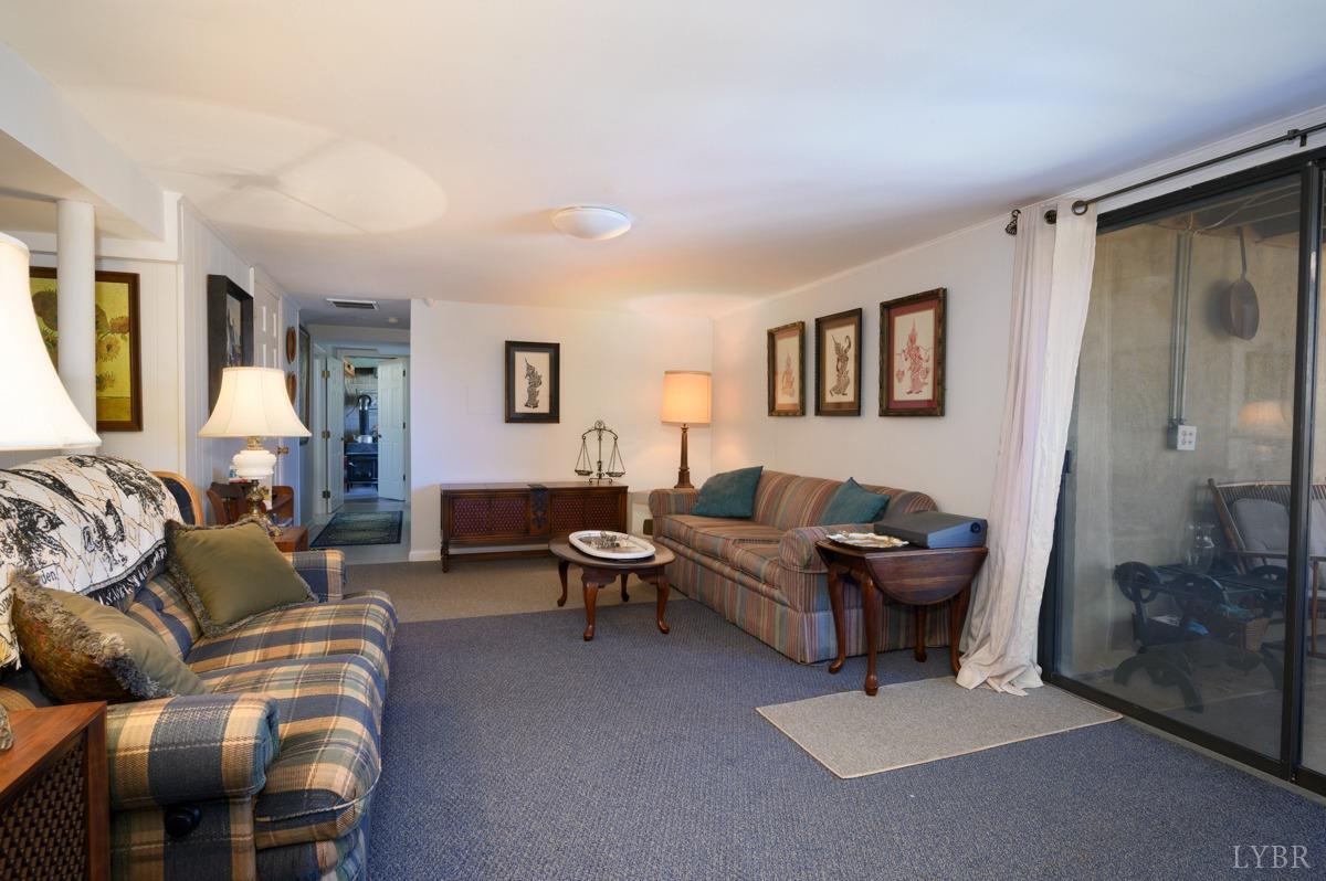 5687 Elon Road Monroe, VA 24574 - Photo 54 of 60 a living room with furniture and a window