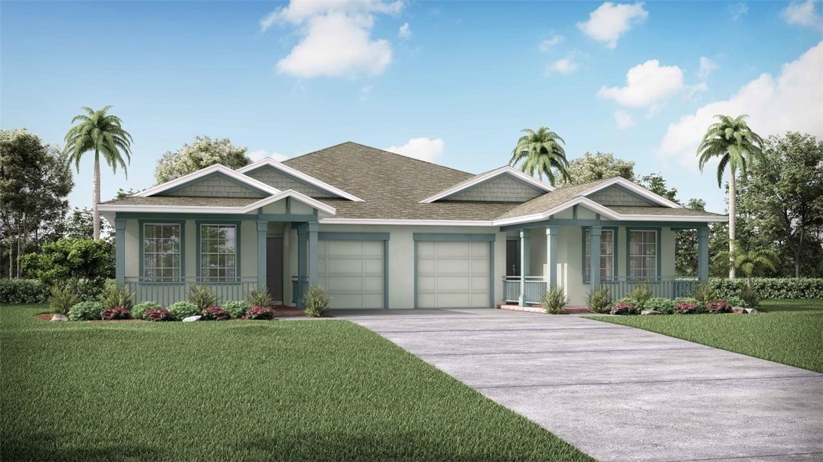 a front view of a house with a garden and plants