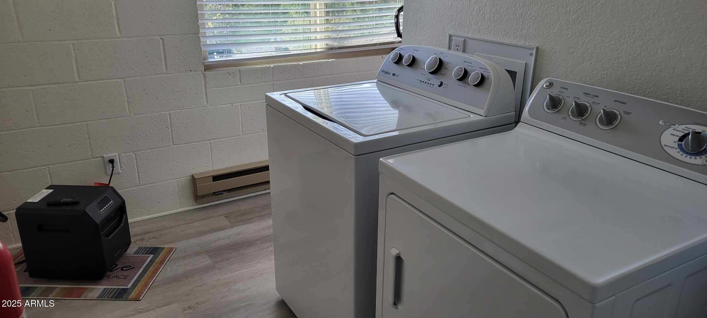 1285 Spruce Street Eagar, AZ 85925 - Photo 17 of 17 a utility room with dryer and washer