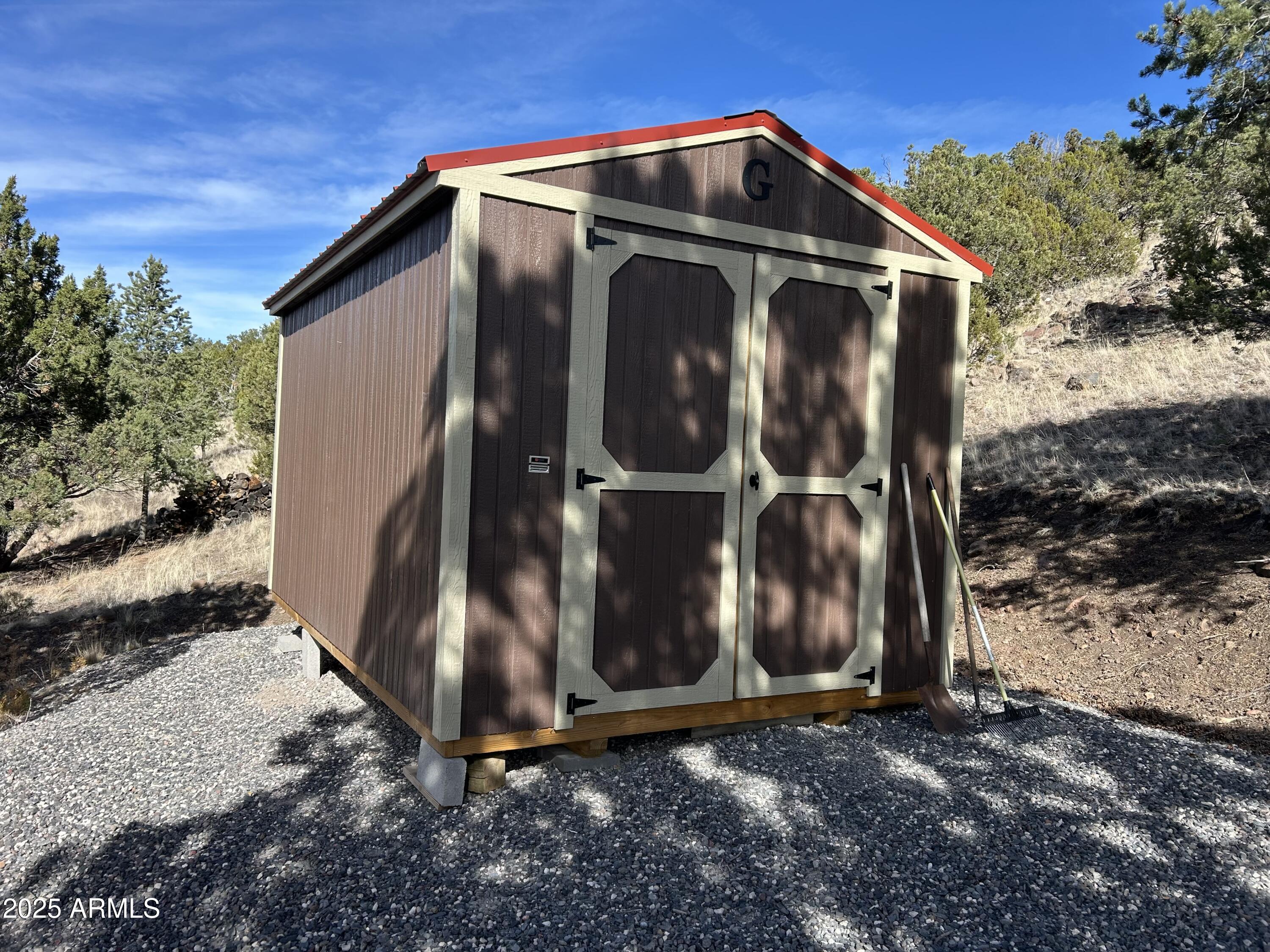 1285 Spruce Street Eagar, AZ 85925 - Photo 10 of 17 a view of door house with wooden fence