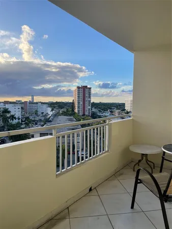 a view of a balcony with city view