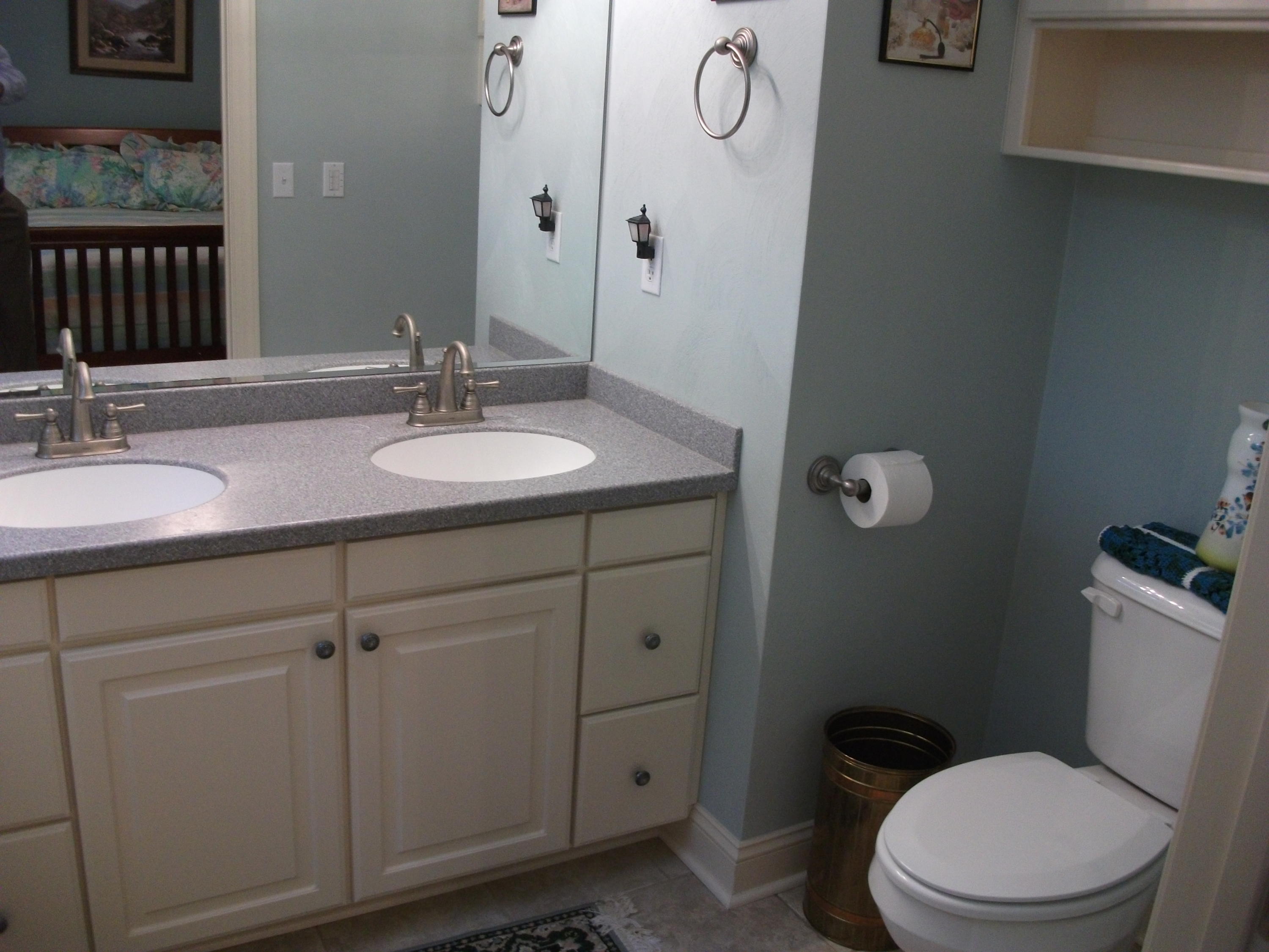 94 Stoney Mill Road Rocky Mount, VA 24151 - Photo 13 of 24 a bathroom with a granite countertop toilet sink and mirror