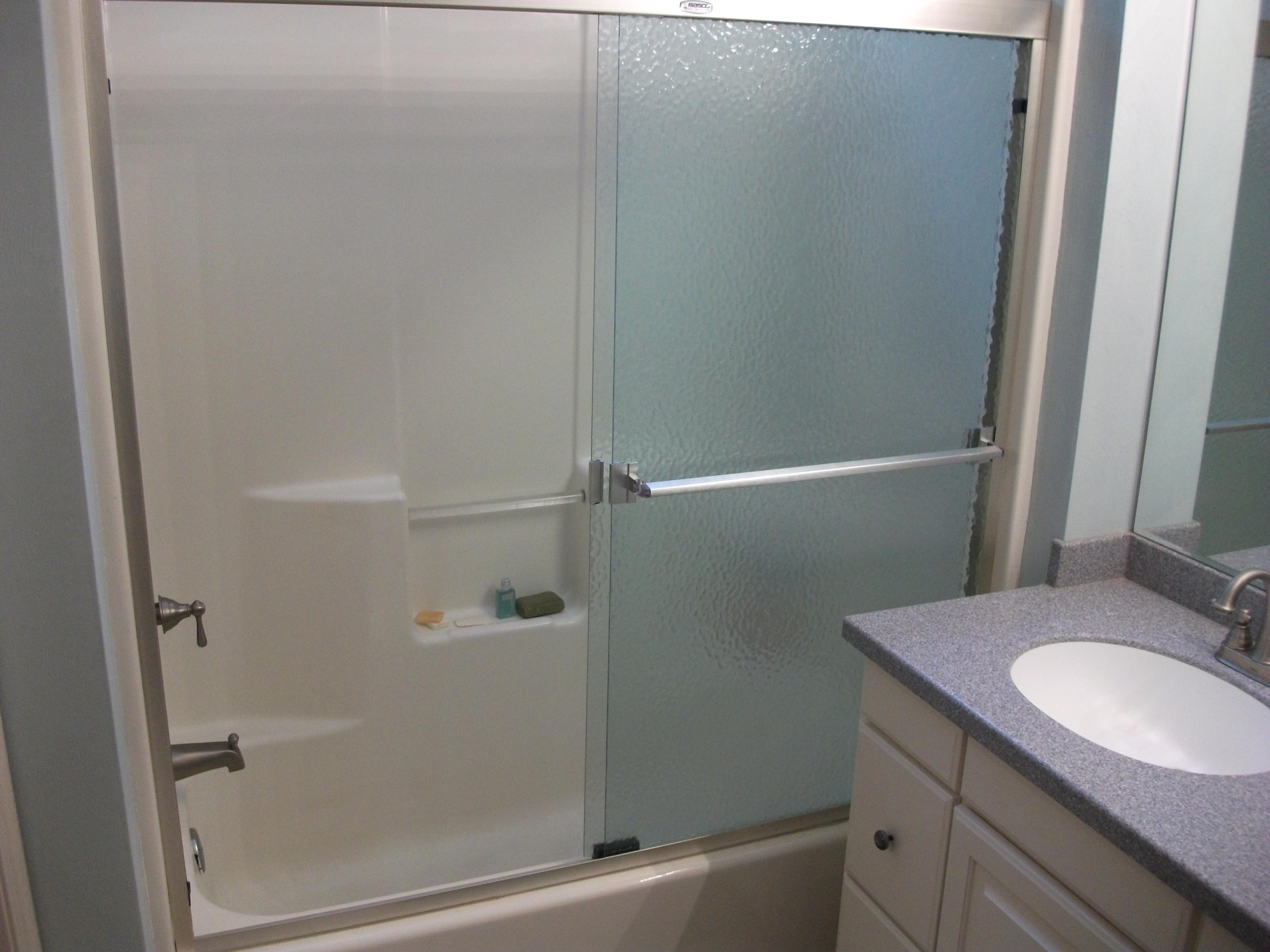 94 Stoney Mill Road Rocky Mount, VA 24151 - Photo 14 of 24 a bathroom with a granite countertop sink toilet and shower