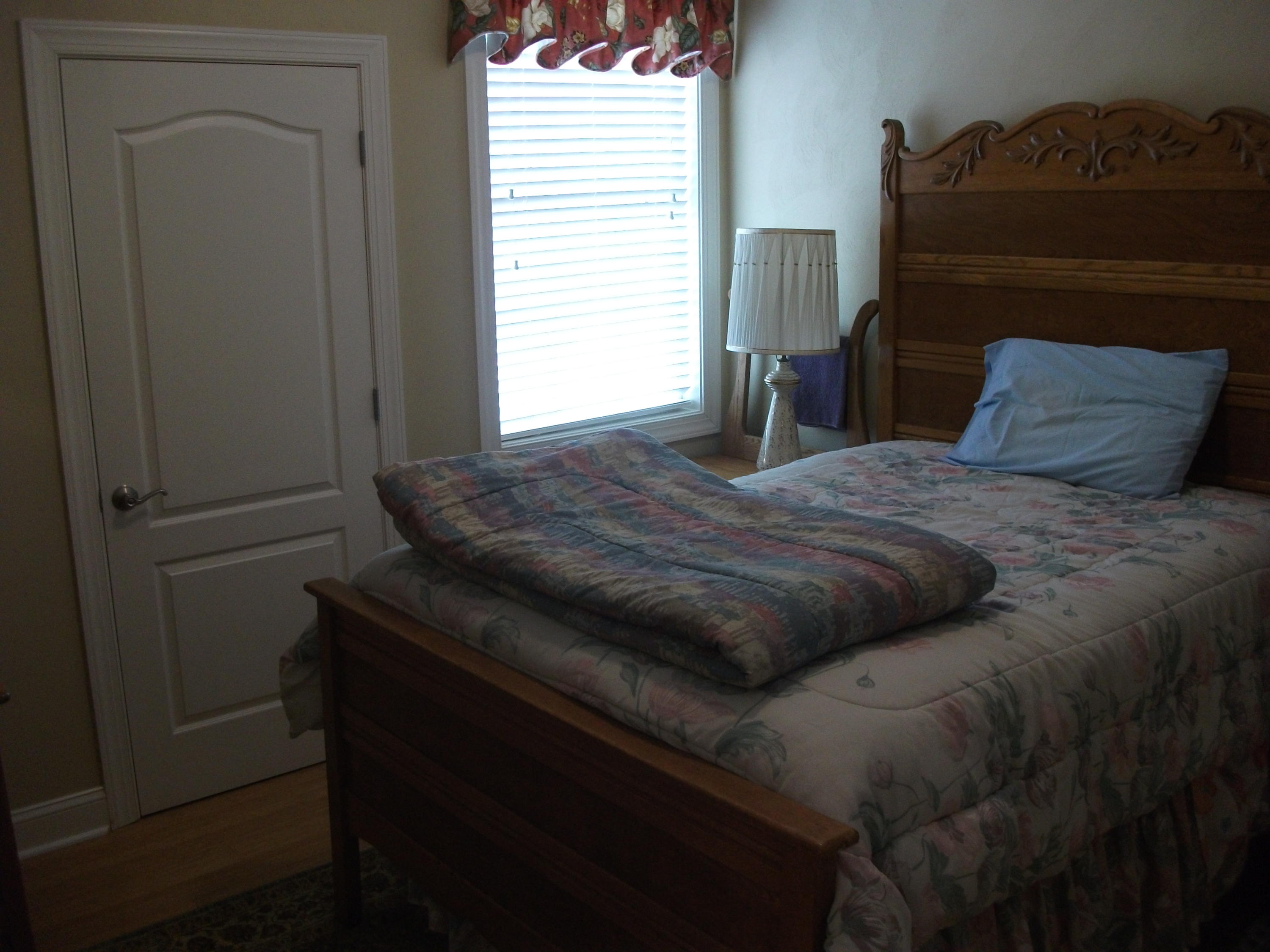 94 Stoney Mill Road Rocky Mount, VA 24151 - Photo 15 of 24 a bedroom with a bed and a window