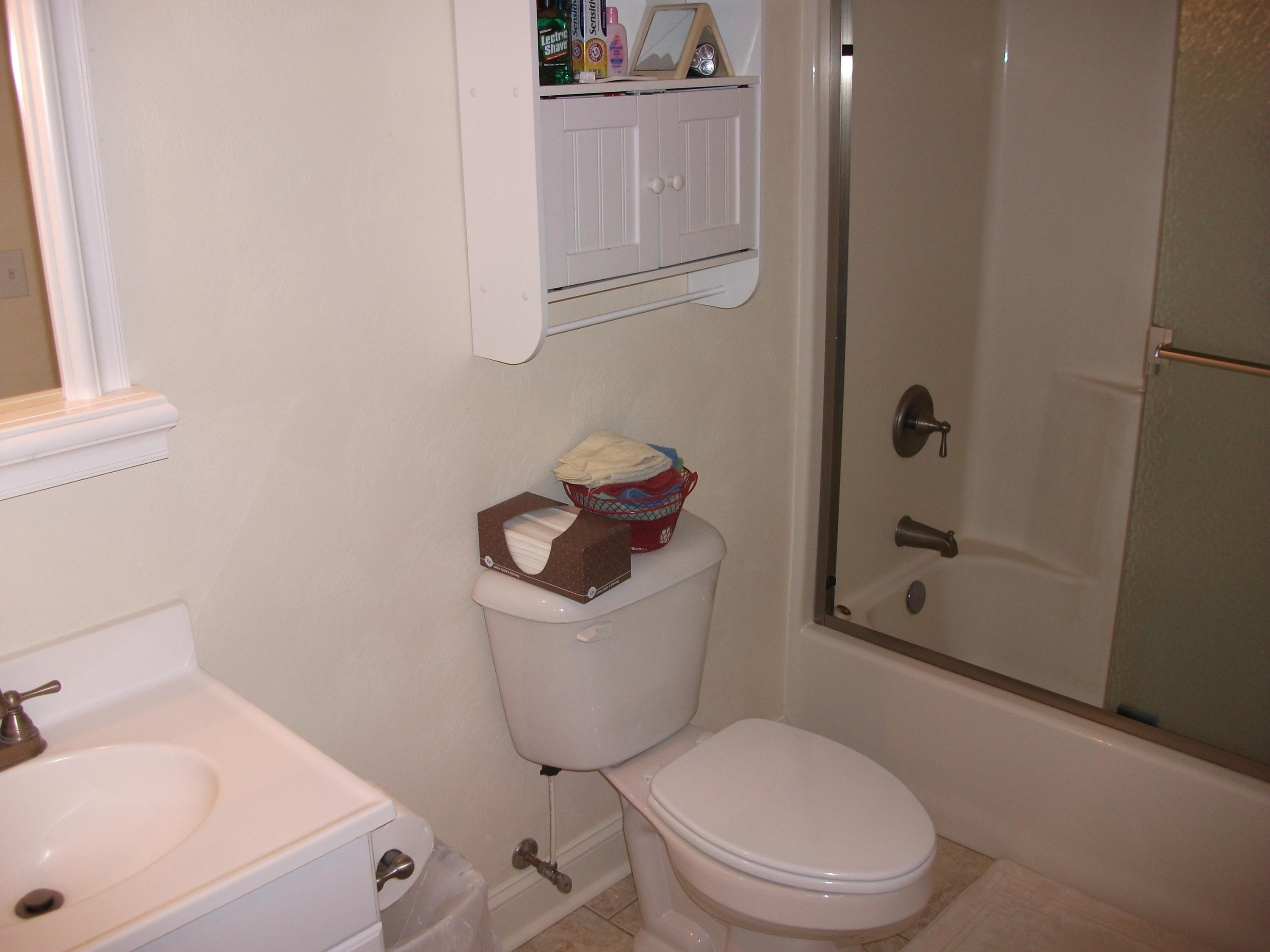 94 Stoney Mill Road Rocky Mount, VA 24151 - Photo 16 of 24 a white toilet sitting next to a bath tub