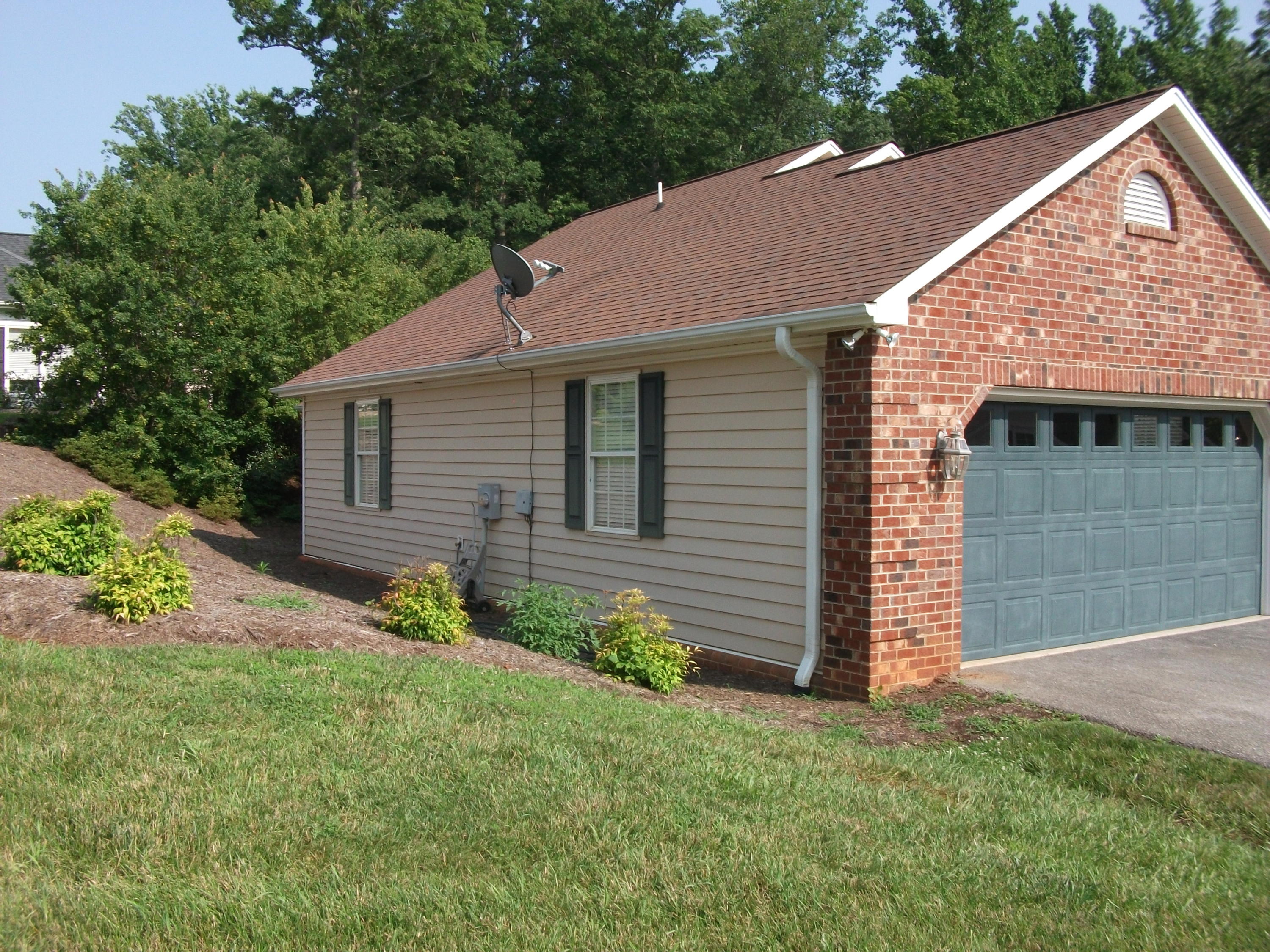 94 Stoney Mill Road Rocky Mount, VA 24151 - Photo 21 of 24 a view of a house with garden