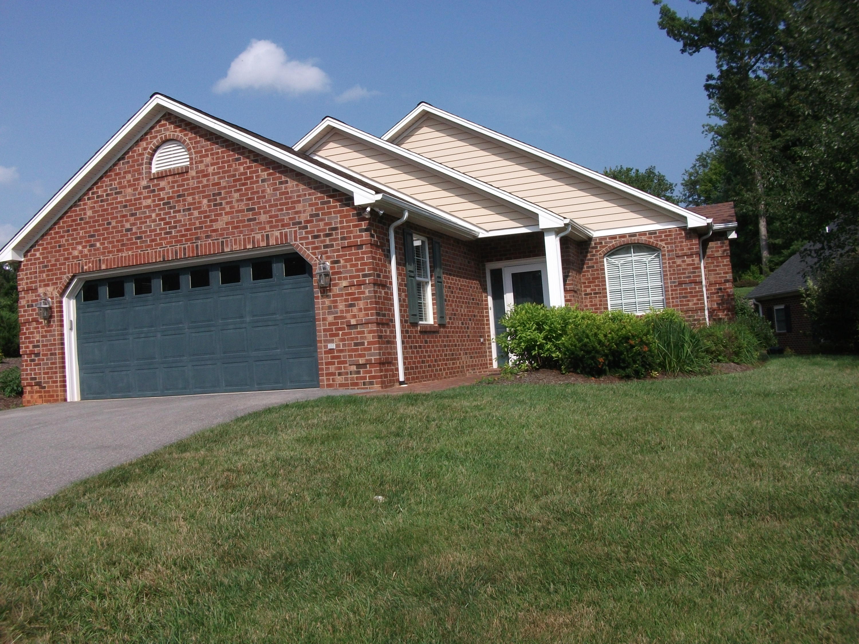 94 Stoney Mill Road Rocky Mount, VA 24151 - Photo 23 of 24 a front view of a house with a garden