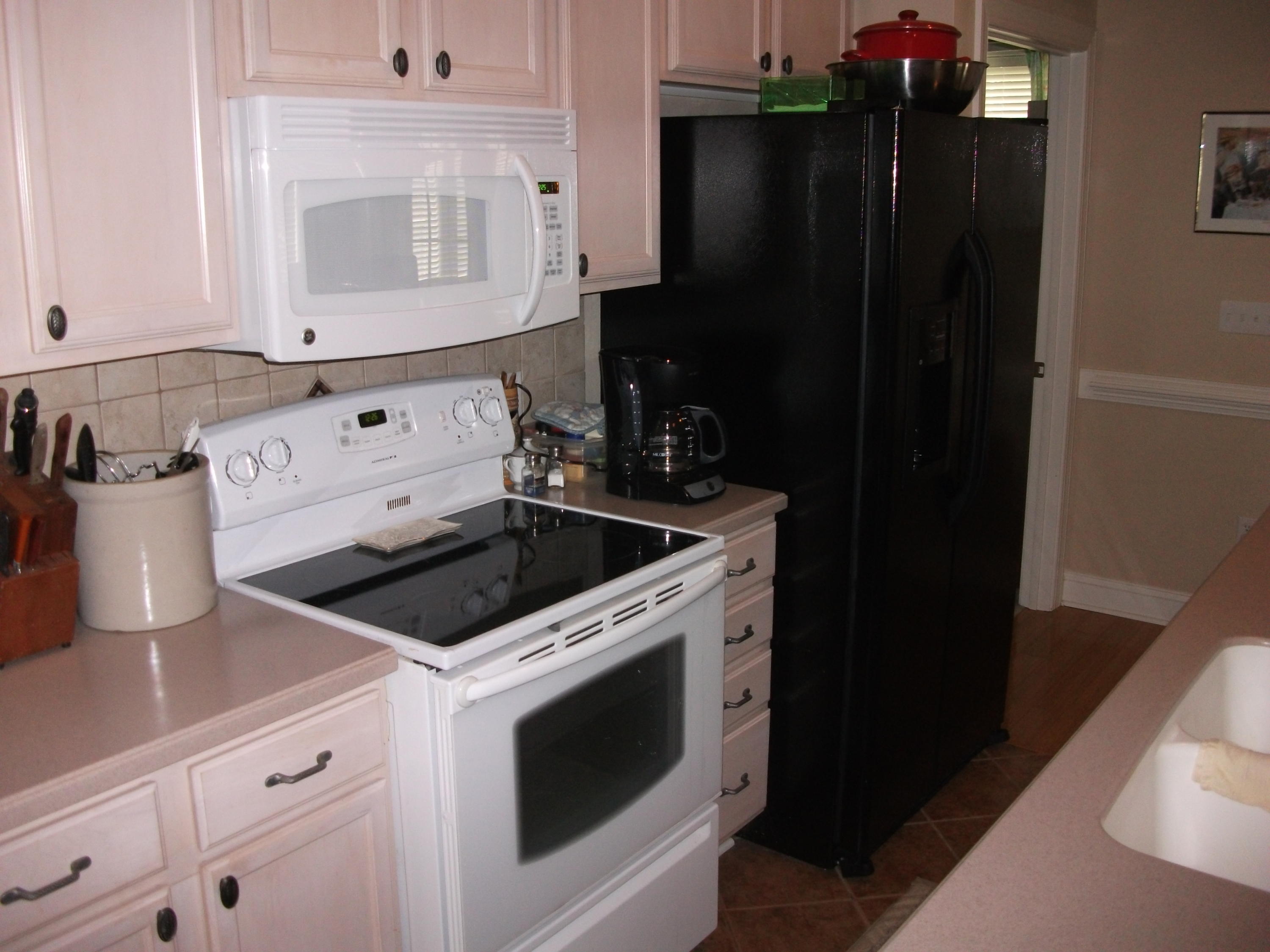 94 Stoney Mill Road Rocky Mount, VA 24151 - Photo 8 of 24 a kitchen with a stove microwave and sink