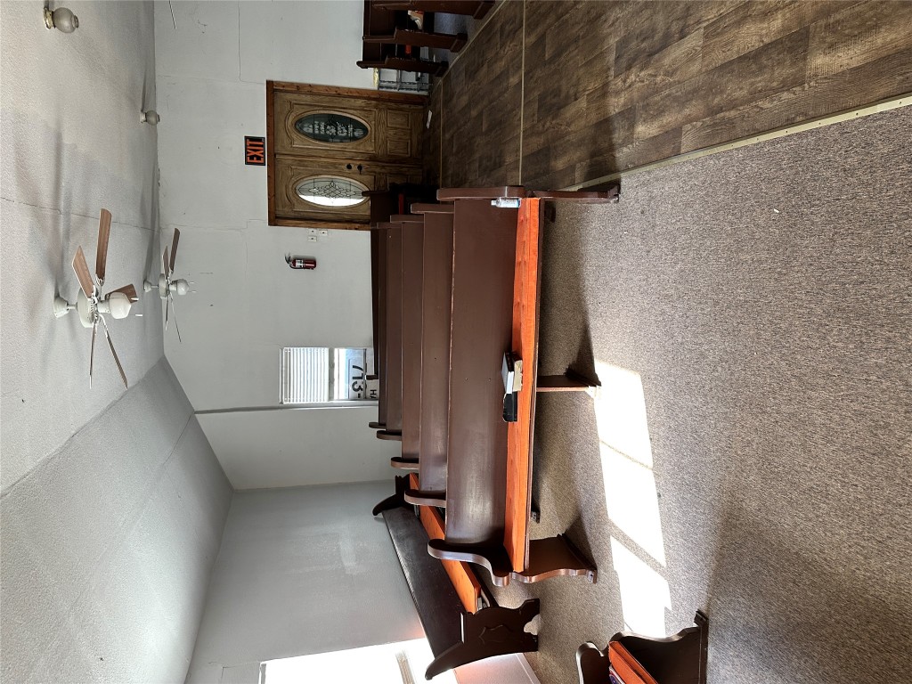 125 2nd Avenue Taylor, TX 76574 - Photo 7 of 9 a living room with furniture