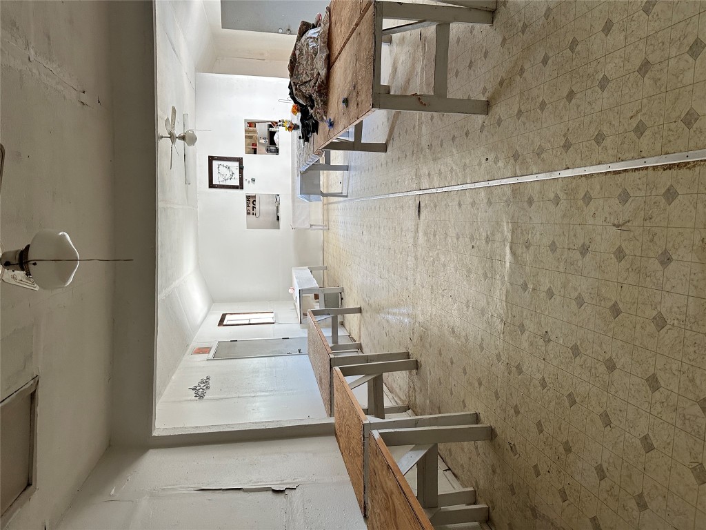 125 2nd Avenue Taylor, TX 76574 - Photo 8 of 9 a view of a room with lots of furniture