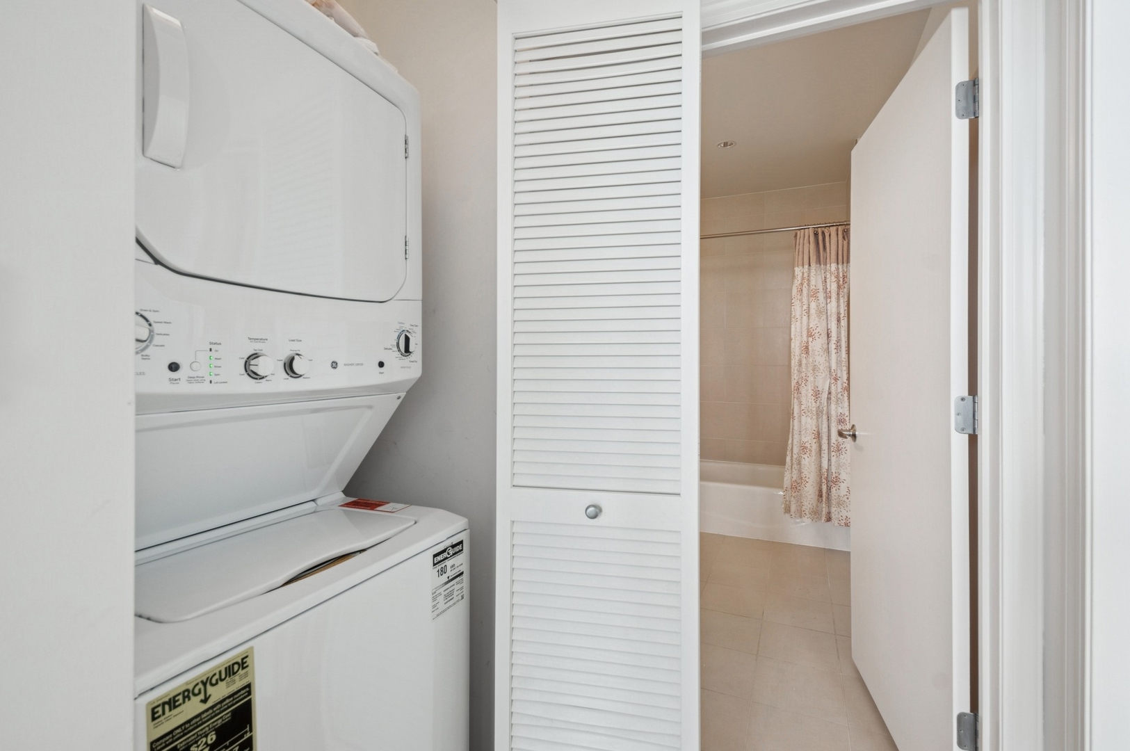 1201 South Prairie Avenue, Unit 4204 Chicago, IL 60605 - Photo 12 of 19 a view of bathroom with a washer and dryer