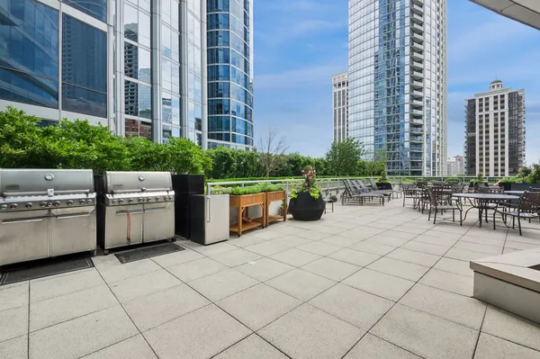 a outdoor space with lots of white furniture