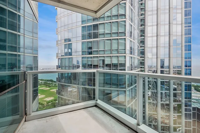 a view of balcony with a floor to ceiling windows