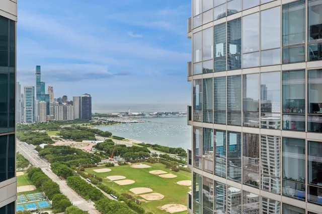 a view of a city with tall buildings