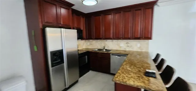 a view of a hallway with a chandelier