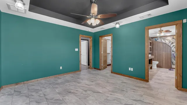 a view of a room with a sink and a large window