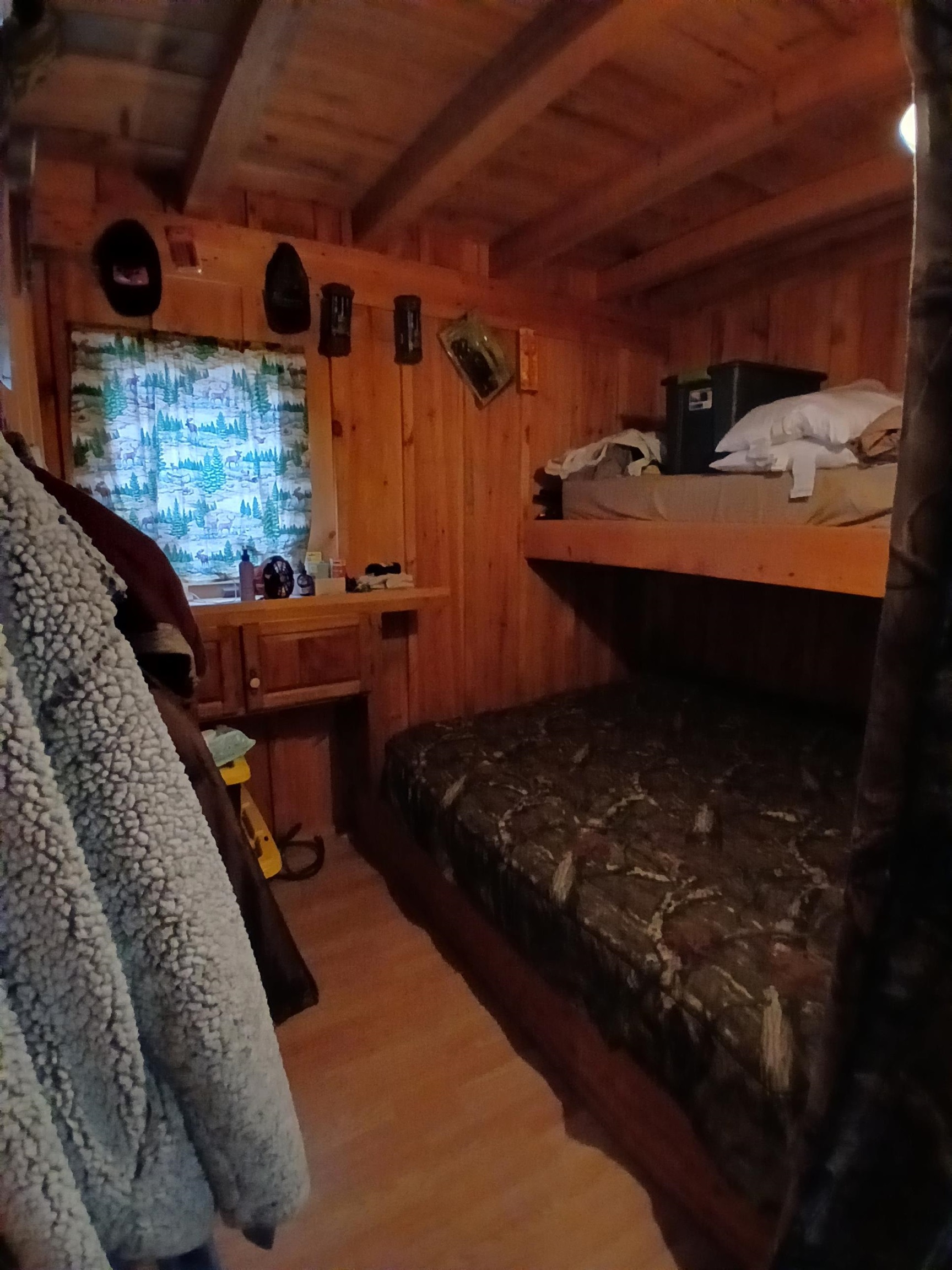 Tbd Echo Trail Tower, MN 55790 - Photo 23 of 35 Bedroom featuring wooden walls, light wood-style flooring, a sauna / steam room, and beamed ceiling