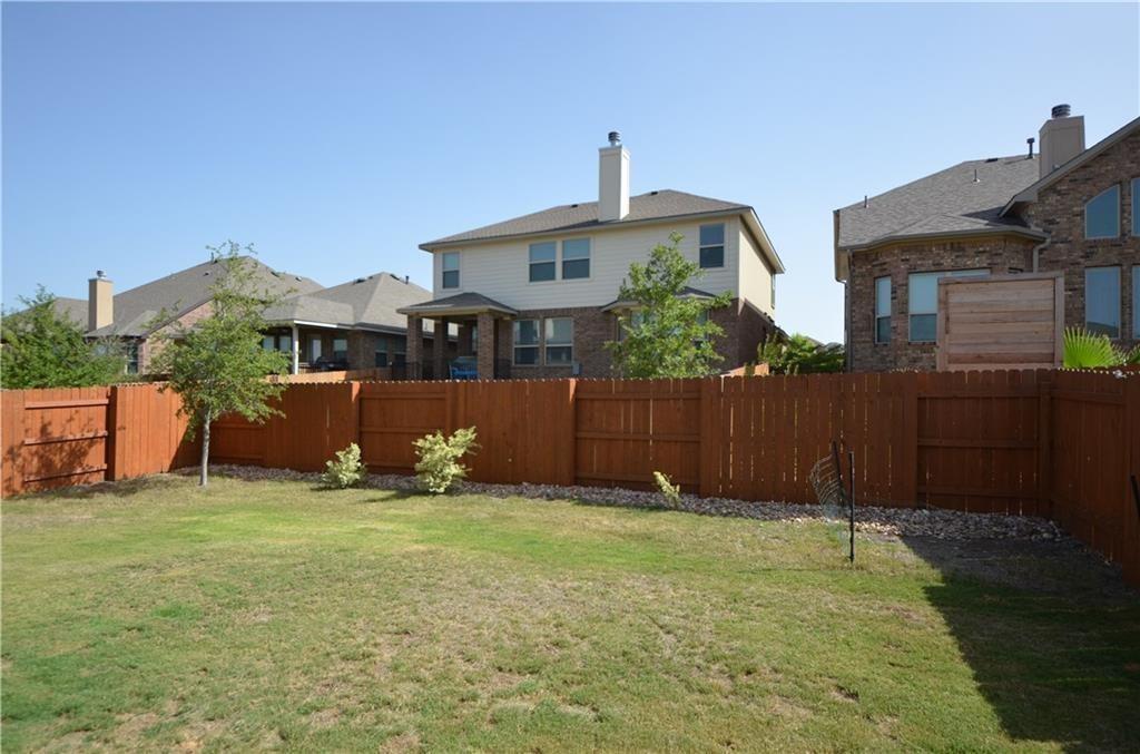 5629 Rio Chama Cove Austin, TX 78738 - Photo 23 of 34 A generous backyard offers a private, fenced space for outdoor enjoyment.