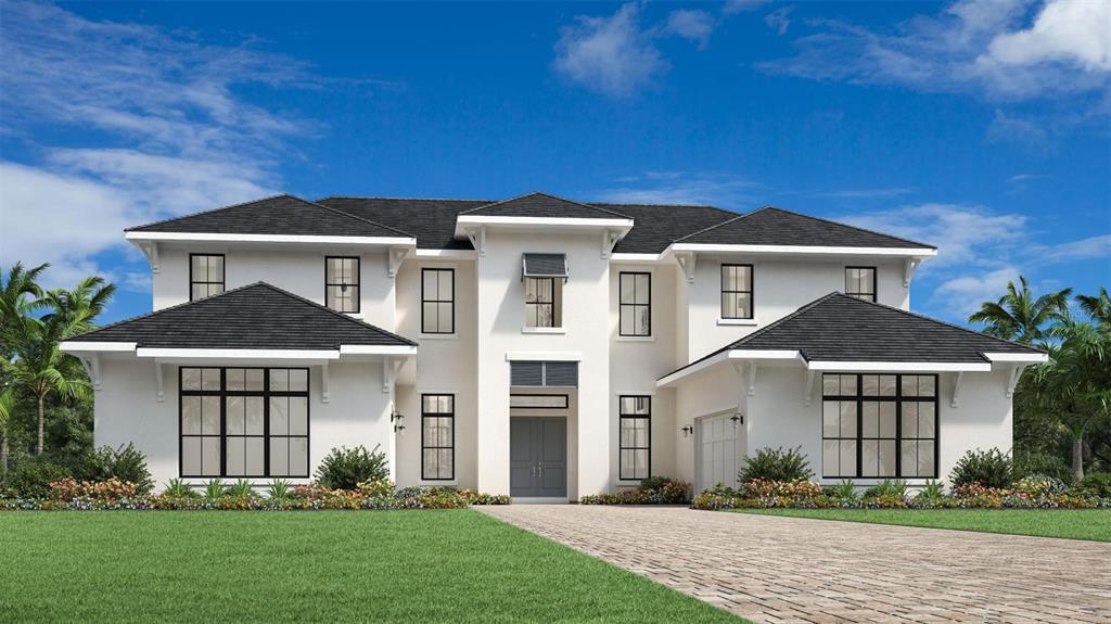 1821 Windermere Road Windermere, FL 34786 - Photo 1 of 19 a front view of a house with a yard