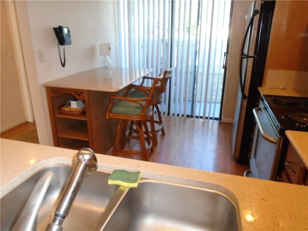 533 Banks Road Margate, FL 33063 - Photo 2 of 31 a view of a living room with furniture and wooden floor
