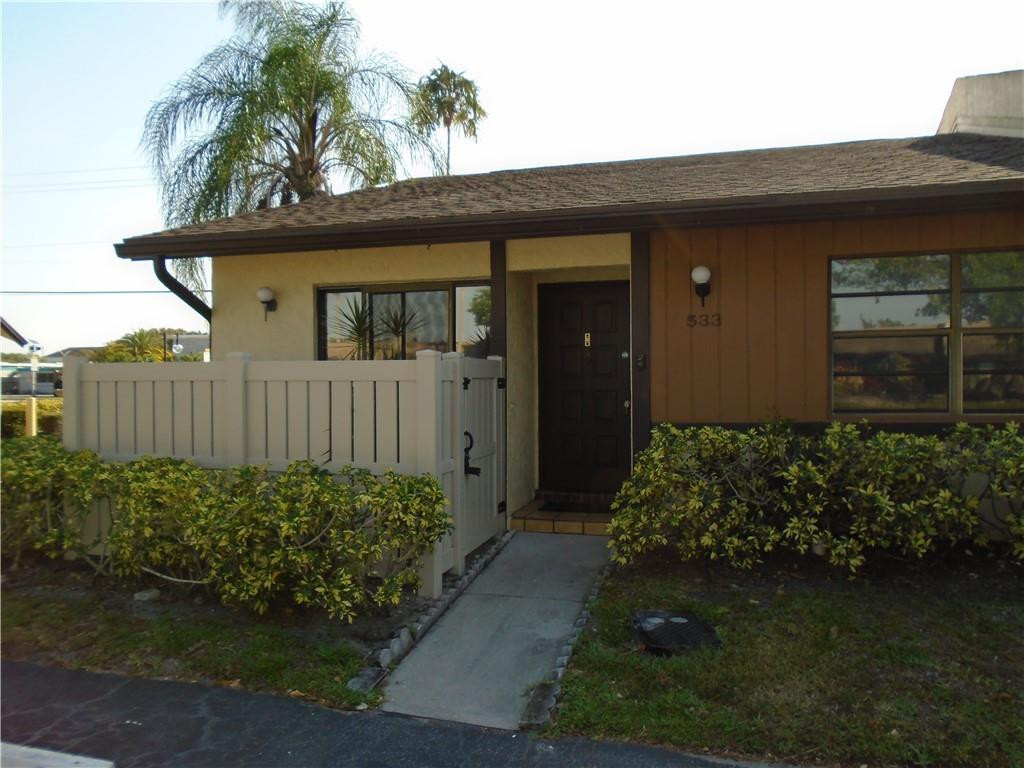 533 Banks Road Margate, FL 33063 - Photo 23 of 31 a front view of a house having garden