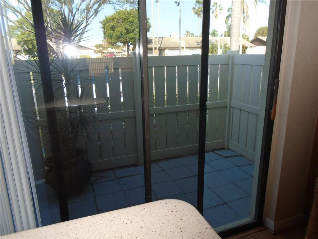 533 Banks Road Margate, FL 33063 - Photo 6 of 31 a bathroom with a glass shower door