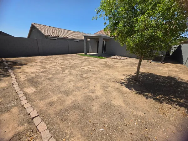 a swimming pool with a yard