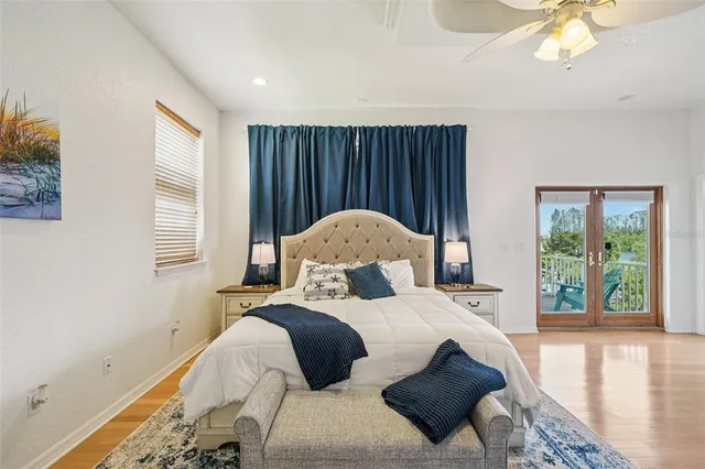 a living room with kitchen island furniture and a chandelier
