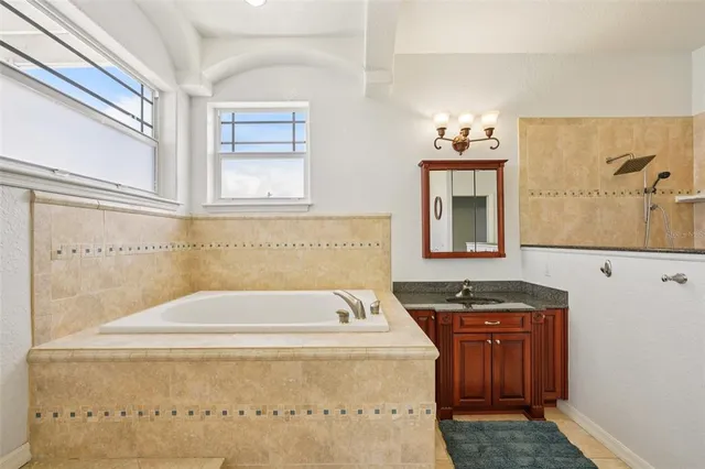 a view of staircase with wooden floor and white walls