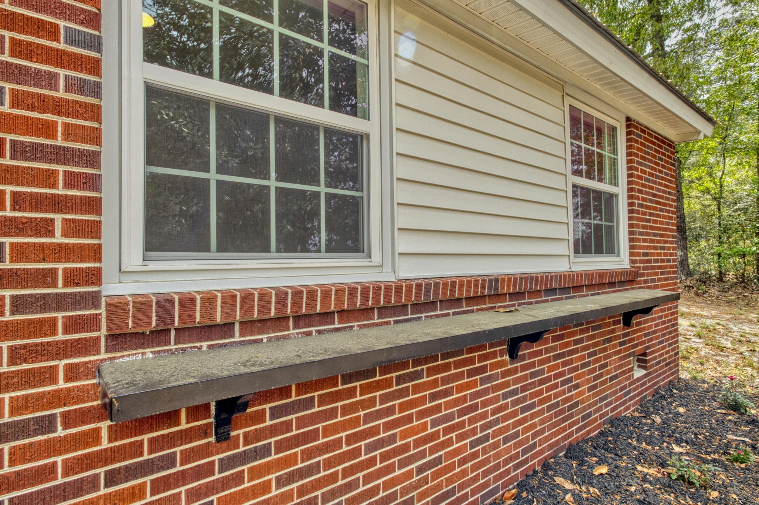 3016 Wagener Road Aiken, SC 29801 - Photo 6 of 29 a view of a house with a large window
