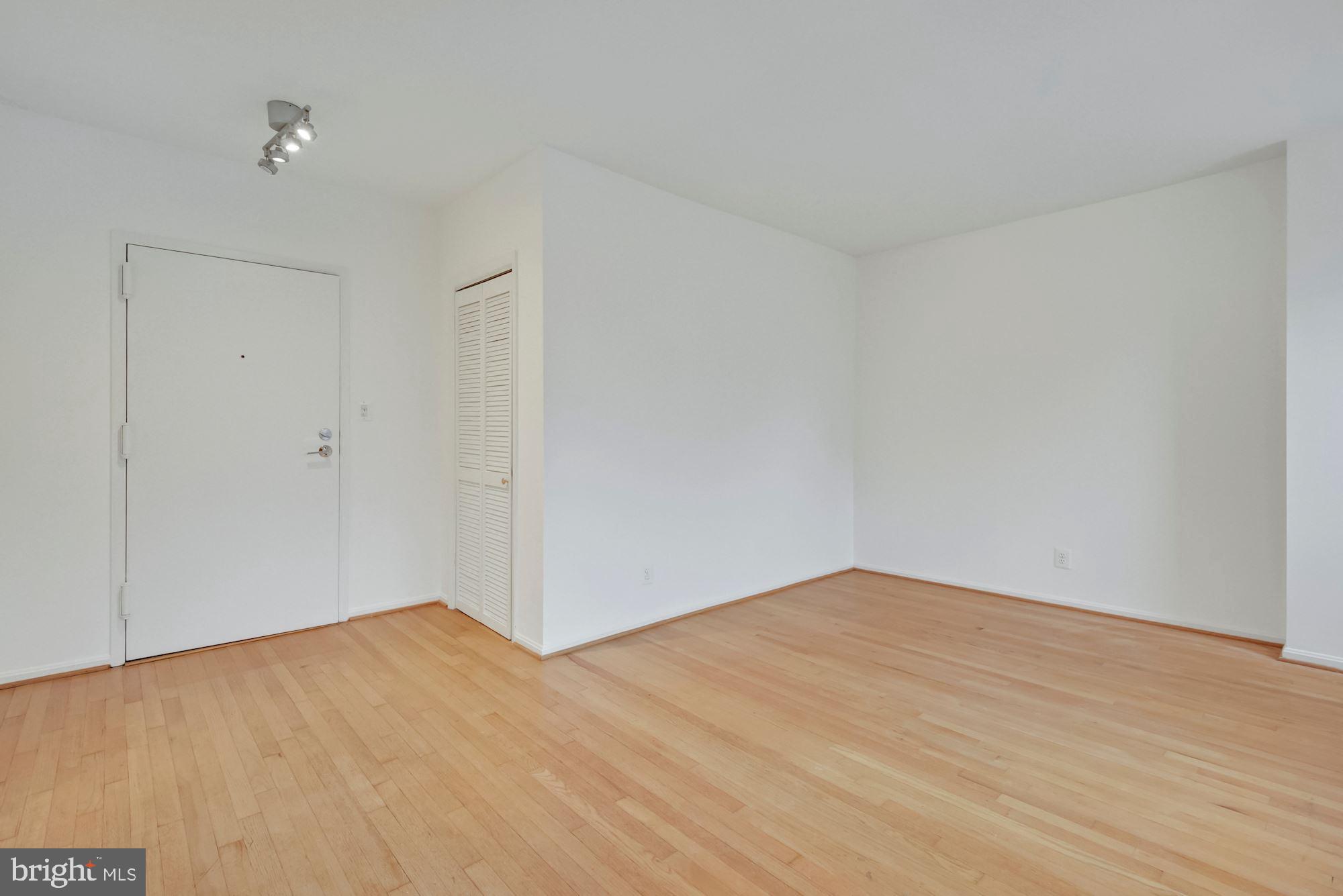 2001 16th Street Northwest, Unit 305 Washington, DC 20009 - Photo 9 of 42 Living Room w/ Coat Closet