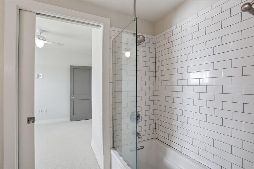 1100 Howell Mill Road Northwest, Unit 608 Atlanta, GA 30318 - Photo 22 of 37 a bathroom with a shower
