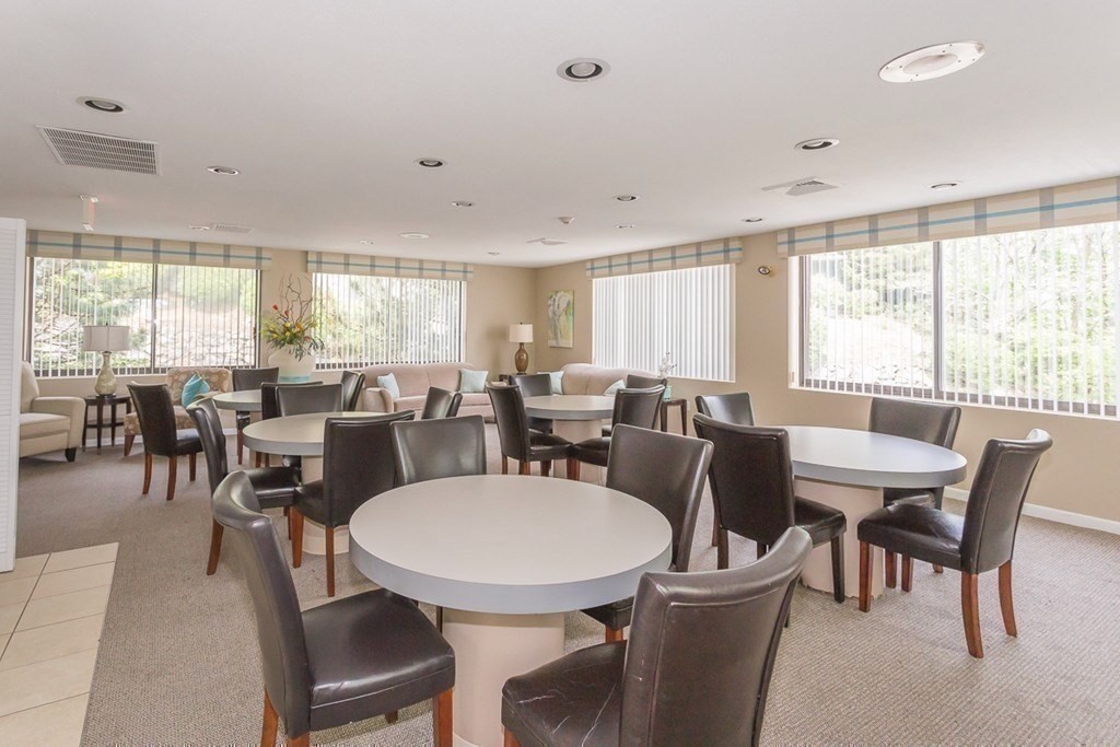 1006 Paradise Road, Unit PHO Swampscott, MA 01907 - Photo 17 of 27 a view of a dining room with furniture window and outside view