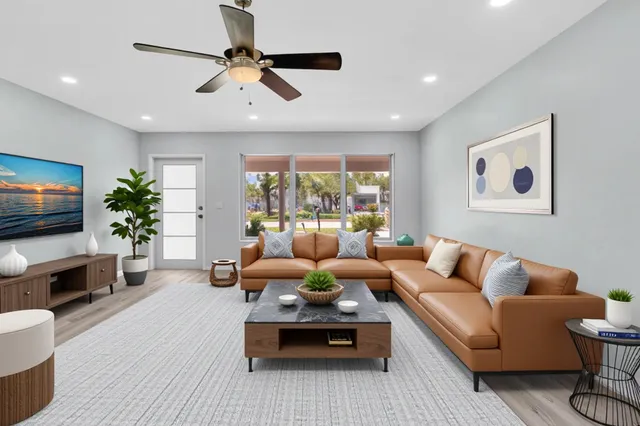 a view of a kitchen with wooden floor