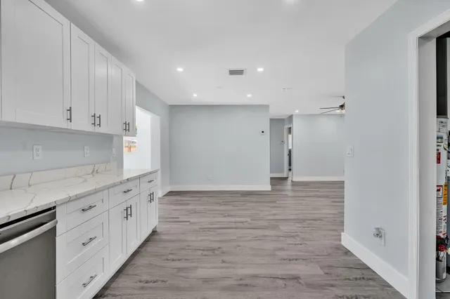 a view of storage and utility room with washer and dryer