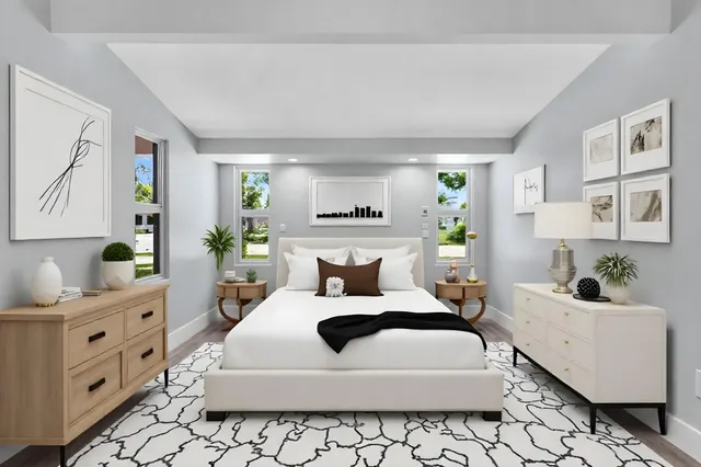 a bathroom with a granite countertop sink toilet a mirror and shower