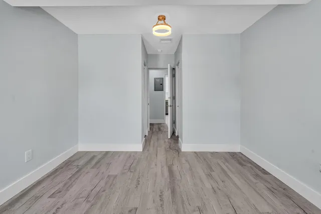 a view of a bathroom sink and a window