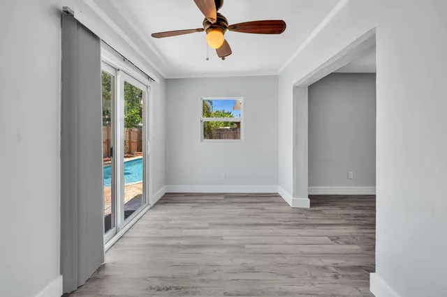 a view of a swimming pool with a lounge chair