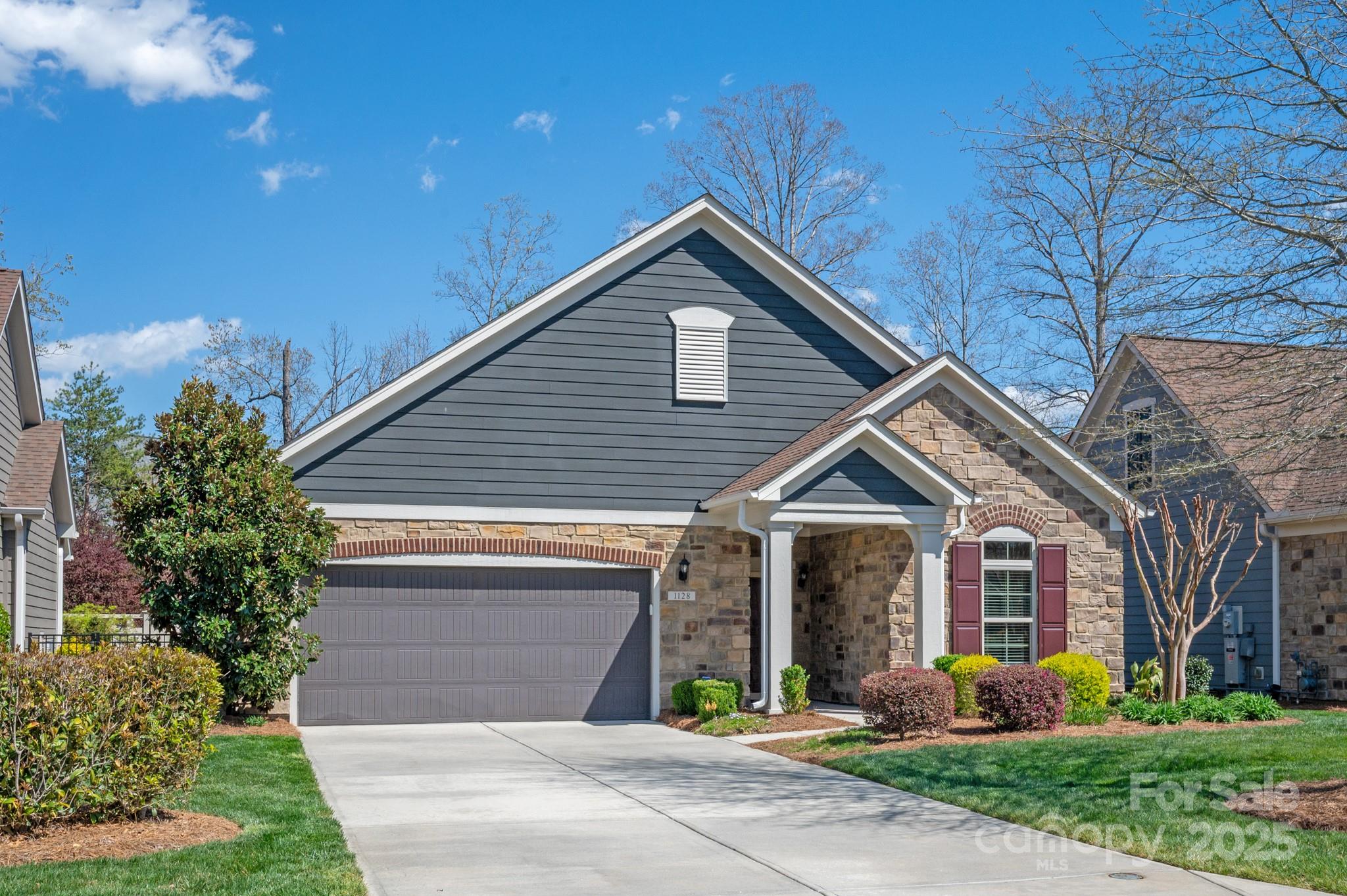 1128 Avalon Place Matthews, NC 28104 - Photo 1 of 39 a front view of house with yard and green space