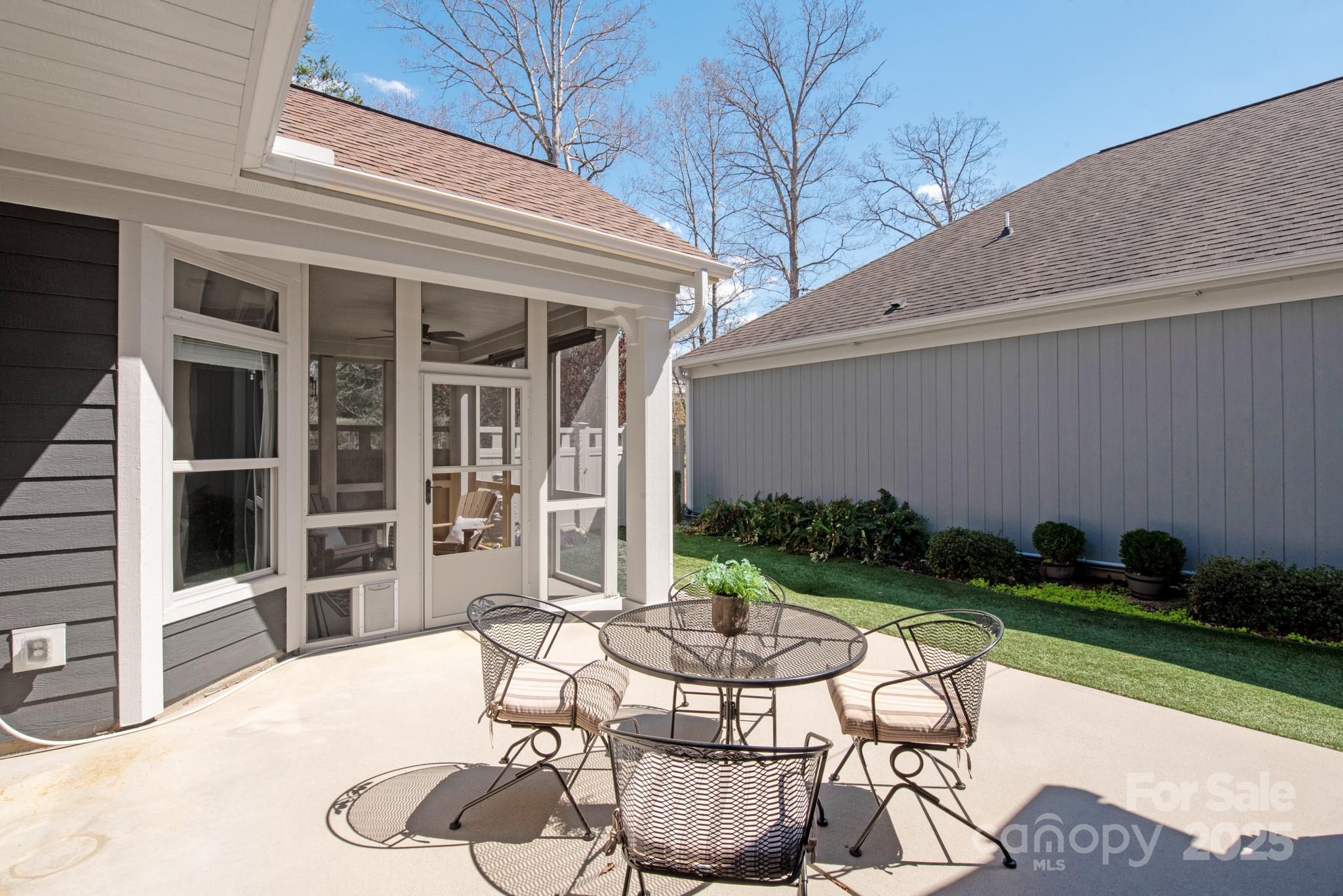 1128 Avalon Place Matthews, NC 28104 - Photo 18 of 39 a patio with yard table and chairs