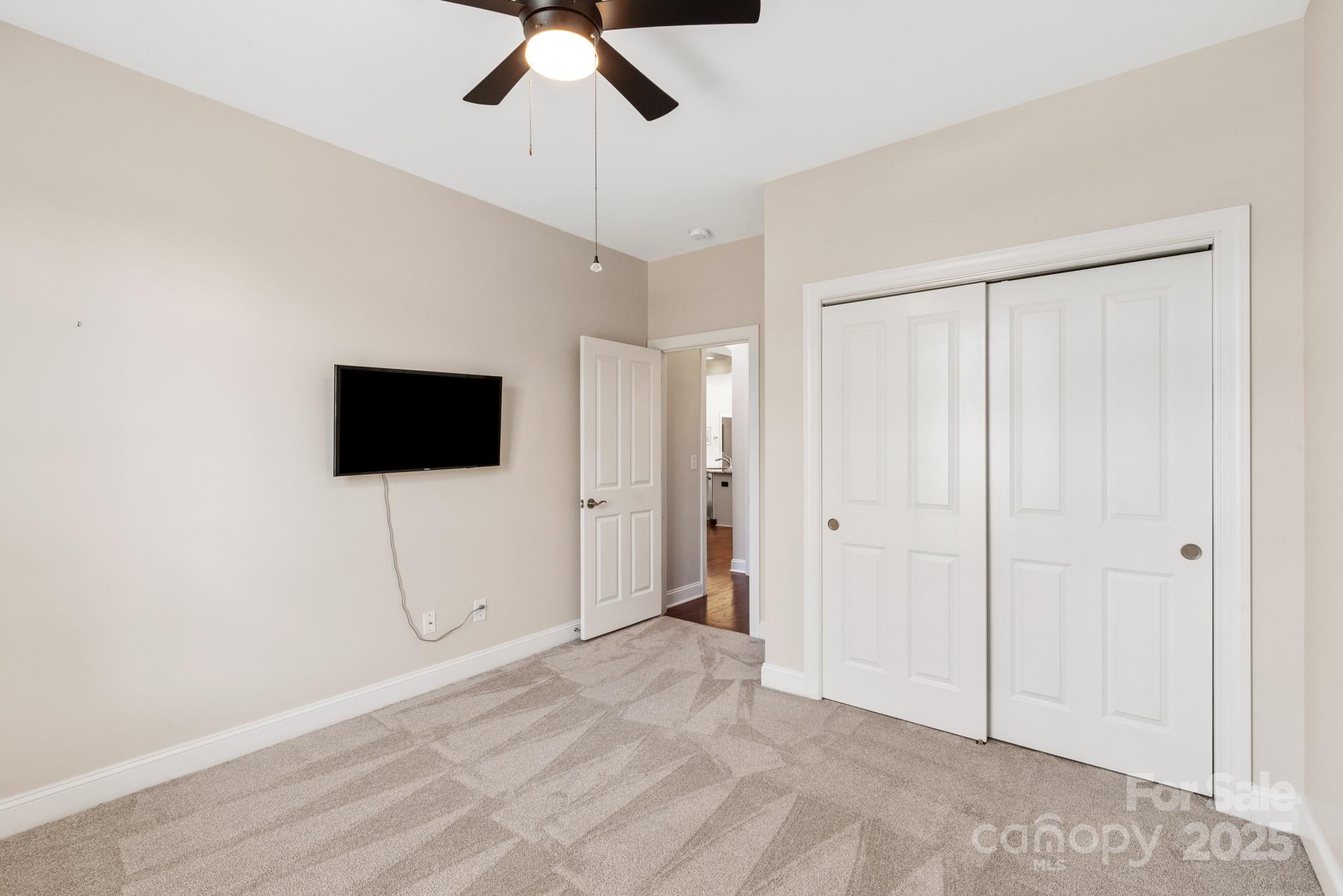 1128 Avalon Place Matthews, NC 28104 - Photo 27 of 39 a view of a livingroom with an empty space