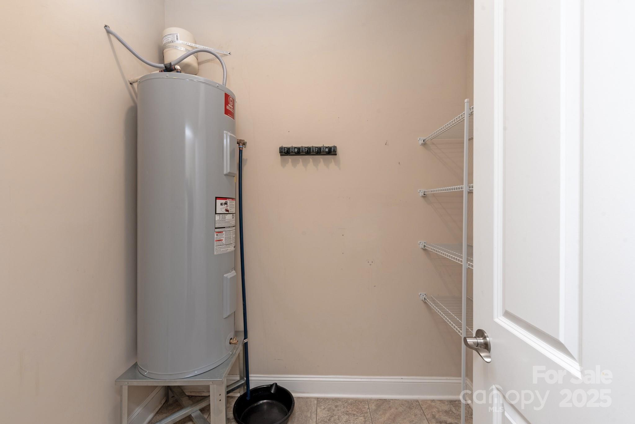 1128 Avalon Place Matthews, NC 28104 - Photo 31 of 39 a bathroom with a granite countertop shower and a sink