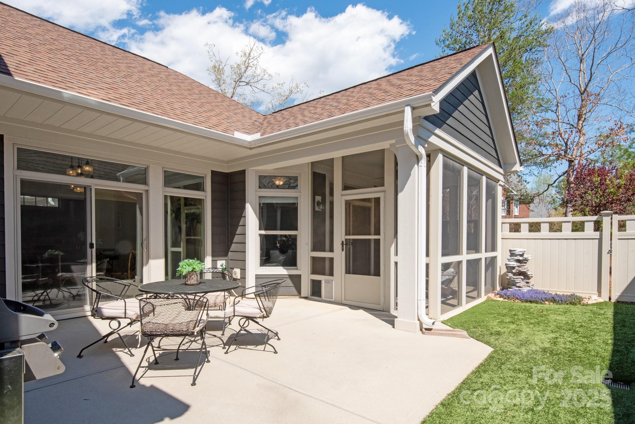 1128 Avalon Place Matthews, NC 28104 - Photo 32 of 39 a view of a house with backyard porch and sitting area