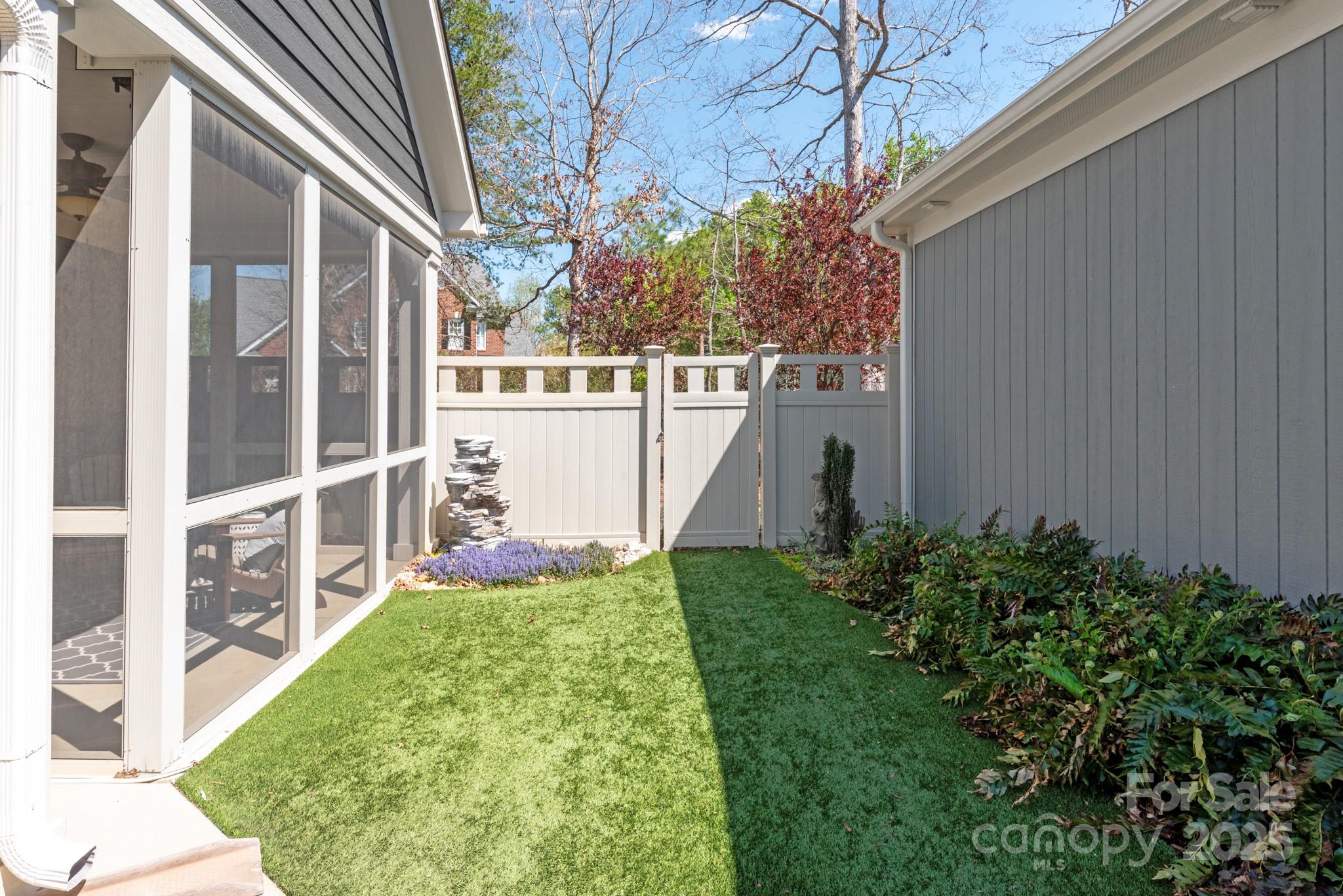 1128 Avalon Place Matthews, NC 28104 - Photo 34 of 39 a view of a garden from a patio