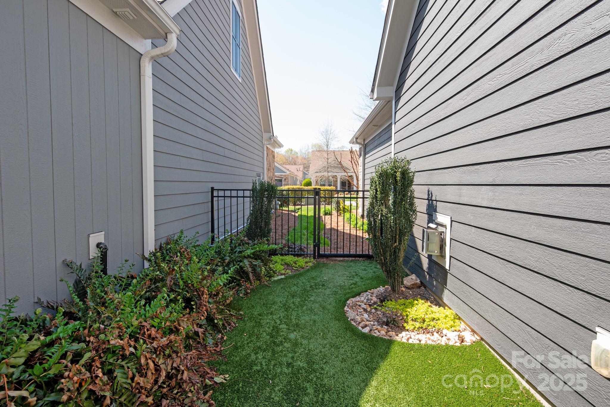 1128 Avalon Place Matthews, NC 28104 - Photo 35 of 39 a view of a backyard with plants