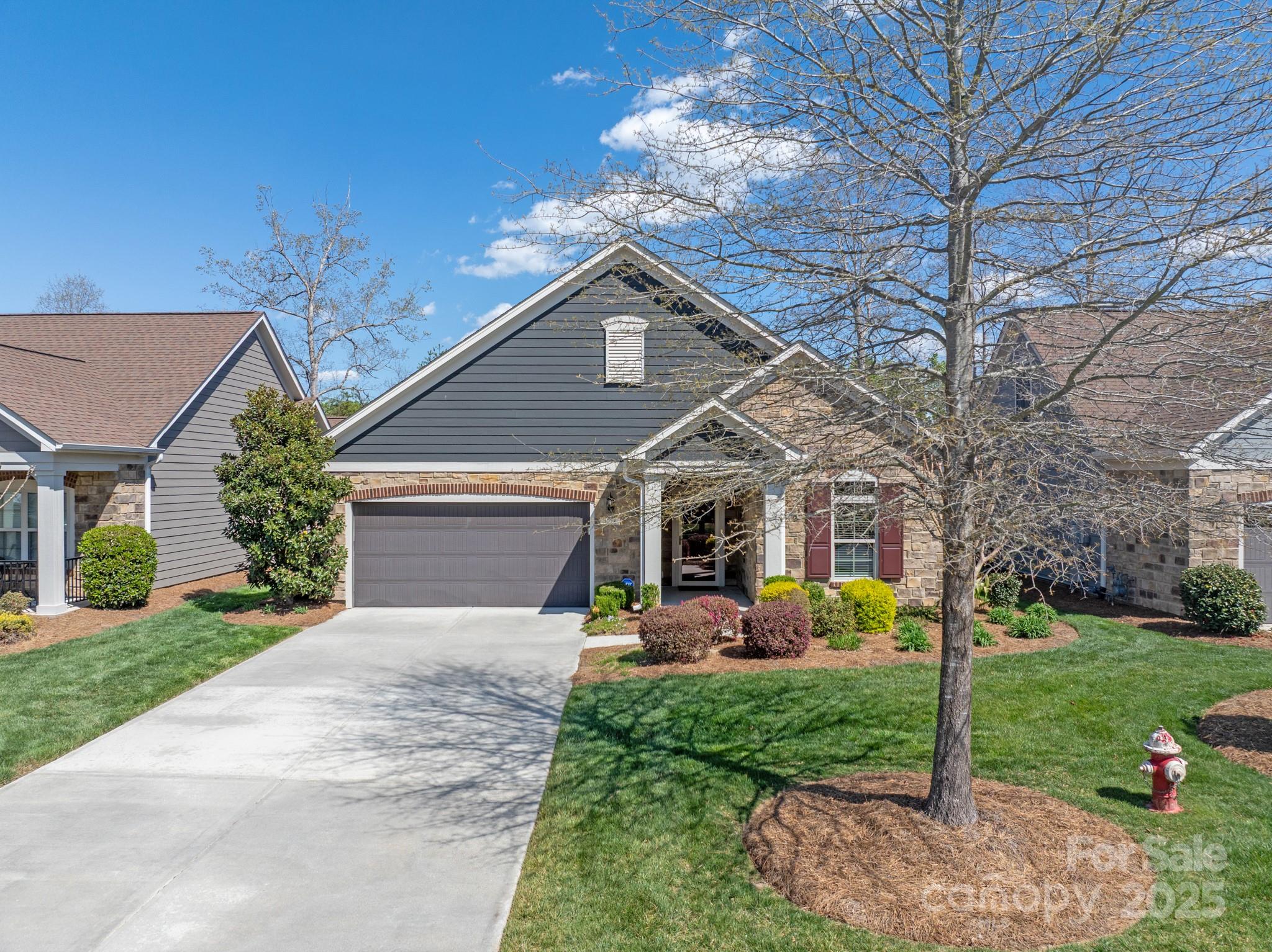 1128 Avalon Place Matthews, NC 28104 - Photo 36 of 39 a front view of house with yard and green space