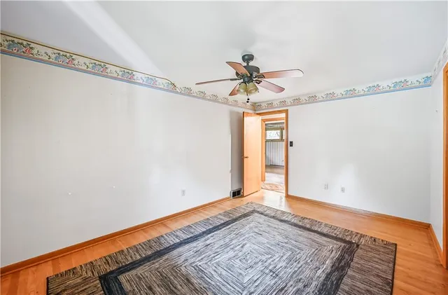 a view of an empty room and window