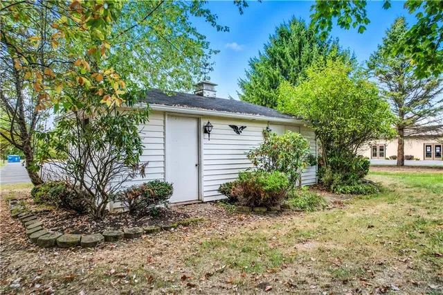 a view of a house with a garden