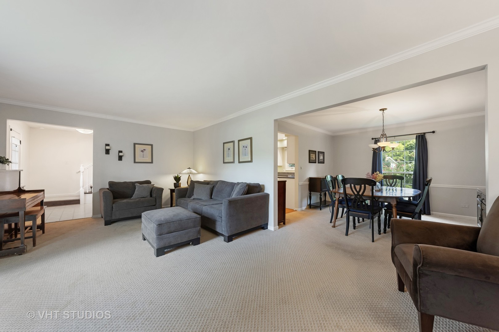 1589 Orth Drive Wheaton, IL 60189 - Photo 3 of 23 a living room with furniture and a chandelier