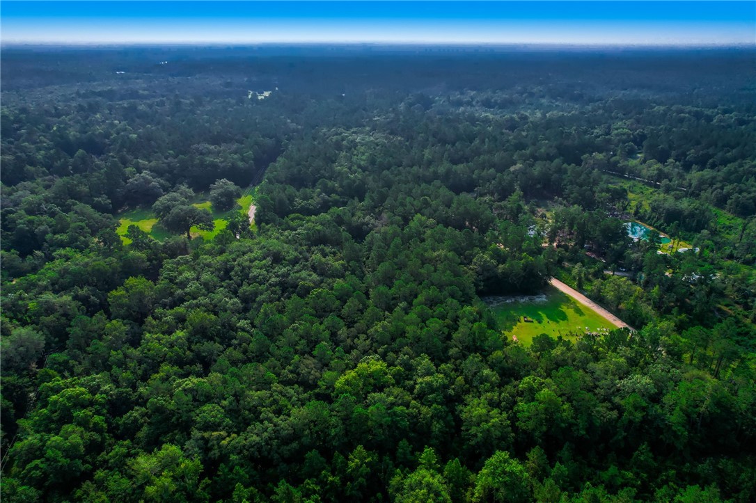 0 Middle Road Hilliard, FL 32046 - Photo 8 of 21 a view of a backyard of a house with a street